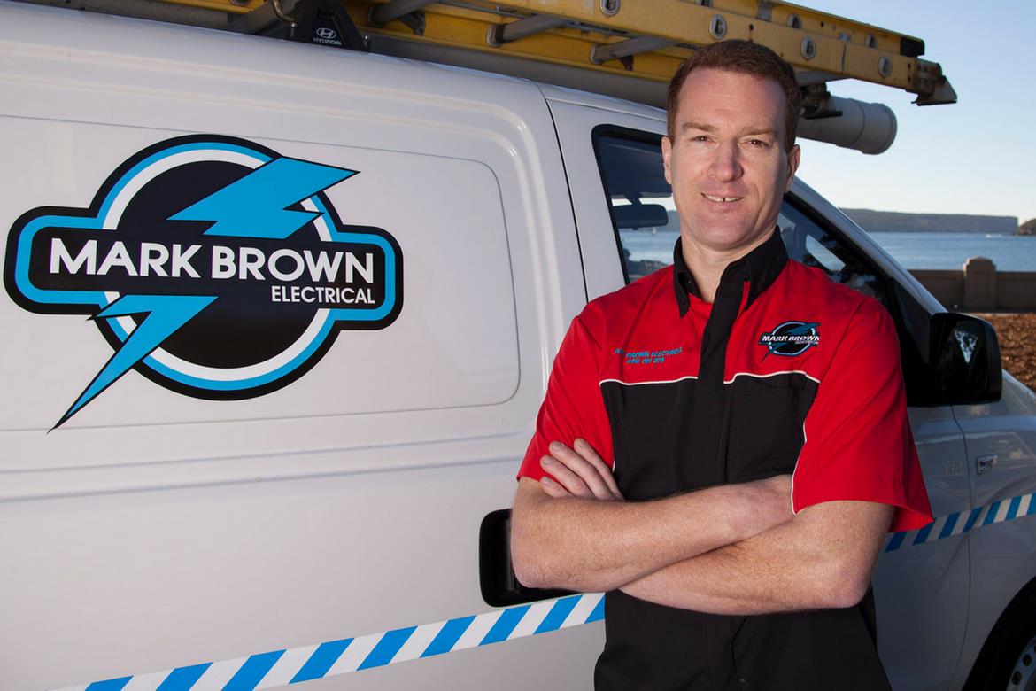 Mark Brown in front of his van for markbrownelectrical.com.au